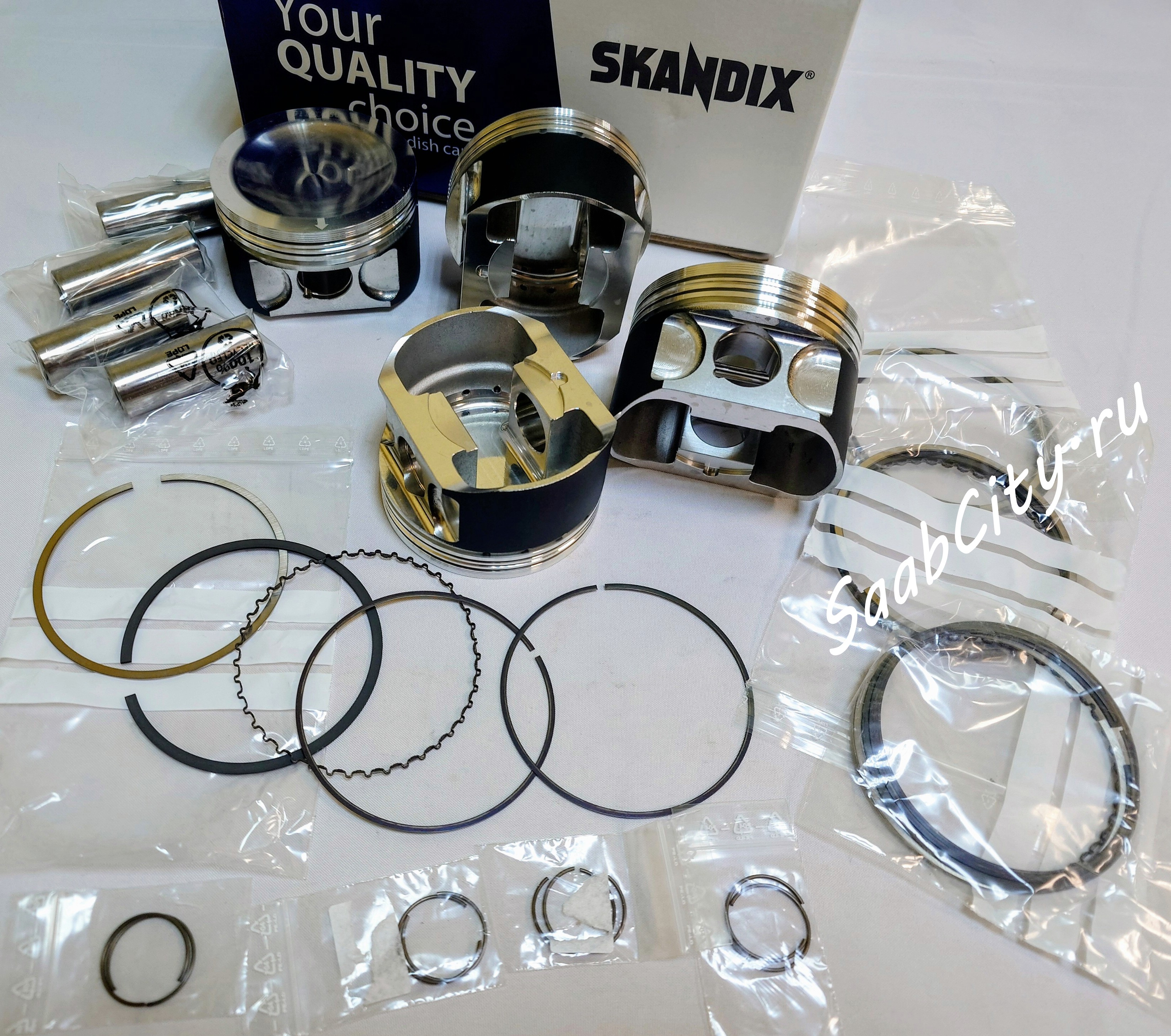 ПОРШНИ КОВАНЫЕ (комплект 4 штуки с кольцами и пальцами) 1-ый ремонт 0,50 мотор B235  SAAB 9-5;  SAAB 9-3 OG Aero (SKANDIX => WOSSNER-Германия) * прямое соединение с шатуном => на машины с 2000 года использовать под эти поршни шатуны 1998-1999 годов